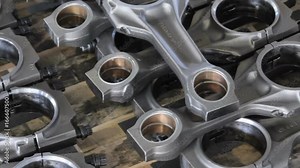 Connecting rod for diesel engine. Part of engine on storage. piston-rod for engine.