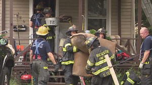 Firefighters battle house fire on Pullman Avenue