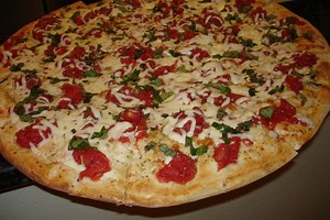 Signature Pizza: Plum Tomato Pizza at The Brick Oven Pizza in Dobbs Ferry