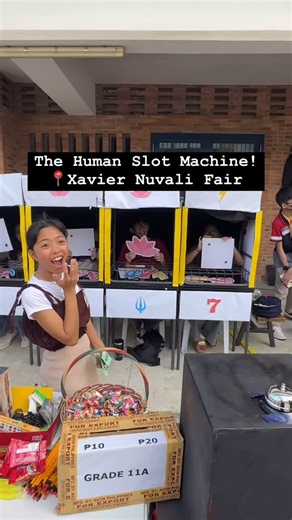 Anton & Rache // OurAwesomePlanet on Instagram: "Trending… The Human Slot Machine! @11a_luckylotus @xavierschool_n The Best Fair Booth Concept I’ve seen in years— so creative and original! Love the overall Lucky Lotus concept @11a_luckylotus by Grade 11A XSN class. The execution was so much fun involving the entire class and the element of randomness makes you want to spin again and again —- 50 chit for 2 spins. Galing Joshua D. & Class 11a! 👏👏👏 #xaviernuvalifair"