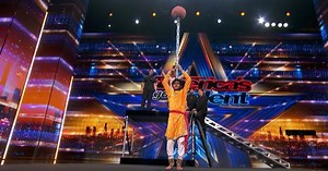 Watch: Indian balances pot and glasses filled with water on his head and dances on US reality show