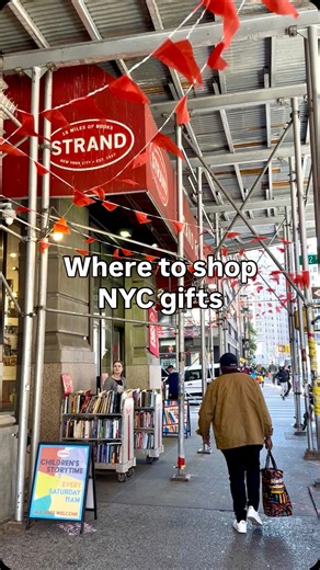 Stef | Books & NYC on Instagram: "Don’t bring back one of those crappy “I ❤️ NYC” t-shirts. Shop at one of these places instead! You can find cute and thoughtful gifts that are wayyy better than anything you’ll find in Times Square, I promise!! 1. @strandbookstore in Union Square is great not only for books but also high-quality NYC ornaments, totes, bookmarks, stickers, etc. 2. @shopofthings in Lower East Side is such a unique store with lots of trendy gifts and the best @BAGGU wall 3. @lockwoo