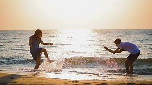 Slow Motion Young Couple Love Splashes Stock Footage Video (100% Royalty-free) 1033107830 | Shutterstock