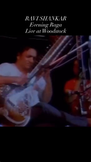 Coffee Music Vibe on Instagram: "RAVI SHANKAR — Evening Raga Live at Woodstock, August 15, 1969 Day 1, rain pouring, thousands in silence. Ravi Shankar (sitar) with Ustad Alla Rakha (tabla) and Maya Kulkarni (tambura) delivered an “evening raga” set that opened many ears at Woodstock. Repertoire included Rāga Puriya-Dhanashri, a tabla solo in Jhaptal, and Rāga Manj Khamaj — recorded and later released as At the Woodstock Festival (1970). ￼ ￼ ￼ It was scheduled around 10 p.m. on Friday and famous
