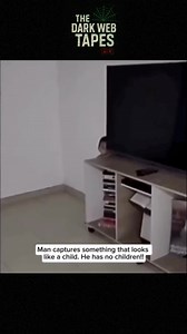 He doesn’t have a child…But something was making noises.So he grabbed his camera.Behind the TV desk… a child-like figure appears.But when he gets closer — it’s gone.Was it a ghost? This one gave us goosebumps too.⚠️ Viewer discretion advised.#DarkTapes #ParanormalEvidence #GhostKid #CaughtOnCamera #HomeHaunting #UnexplainedFootage #ChillingEncounter #ScaryVideo #SupernaturalSighting #CreepyCaughtOnTape | The Dark Web Tapes