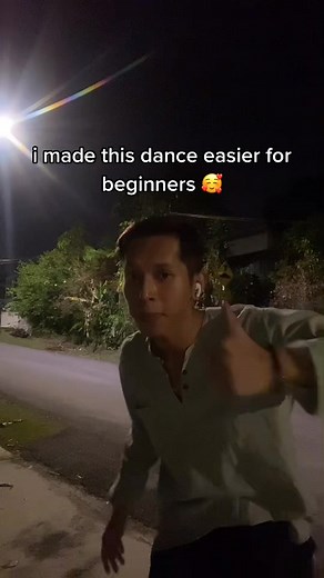 Beginner's Dance Moves Tutorial on a Night Street
