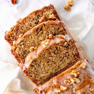 Make the BEST Eggless Banana Bread with this easy recipe! Made with simple ingredients. The batter takes about 10 minutes to throw together and it produces a delicious bread with has the perfect texture…moist and dense! Totally irresistible. | Mommy's Home Cooking