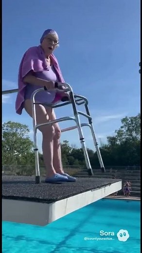 Granny dives into the pool doing a front flip with her walker