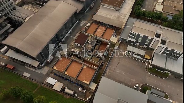 Aerial View of Palm Oil Industrial Facilities and Agriculture Fields in Malaysia on a Clear July Day