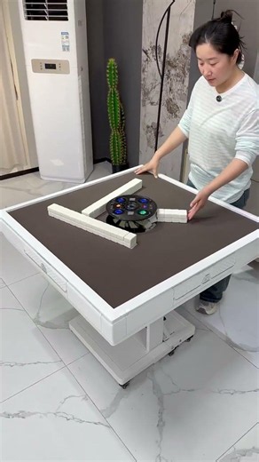 white Ceridwen Chinese Automatic Mahjong Table features a 98x98cm surface, locking wheels,