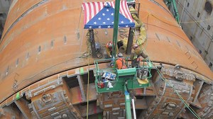 Pieces of tunnel boring machine 'Bertha' slowly being removed from disassembly pit