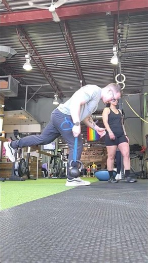 Band suspended kettlebell RDL