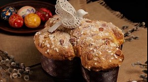 COLOMBA cake is a traditional Italian Easter dessert. Easter cake with a dove slowly rotates around its axis. Front view Stock Video