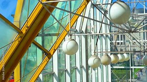 Moscow / Russia - 17 Aug 2020: Video as the camera moves down inside the pedestrian Bogdan Khmelnitsky Bridge in Moscow, yellow beams and lights