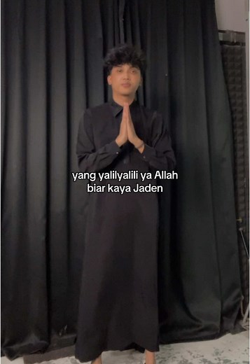 Spiritual Hand Gestures by Jaden in Traditional Attire