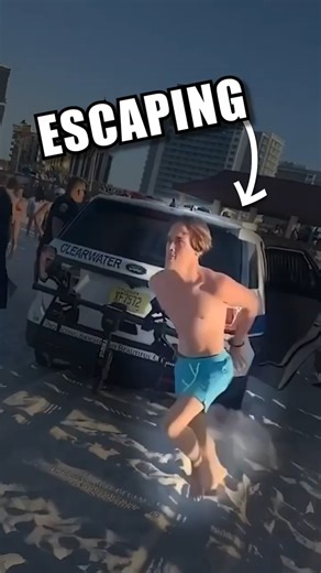 Handcuffed Teen Flees from Police Car