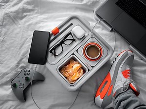 The Couch Console Organizes Your Drinks, Snacks, Phone, and Remotes