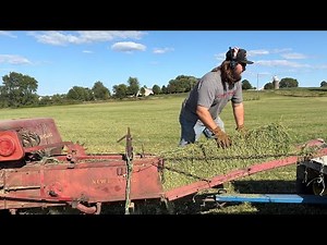 Dad makes his very first hay bale with son’s New Holland hayliner 68