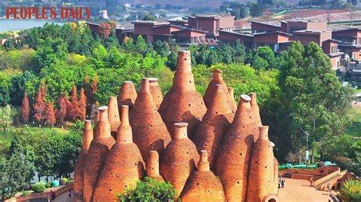 The fascinating red brick architecture at Dongfengyun Town in Mile City, southwest China’s Yunnan Province, blends effortlessly into the natural surroundings, inviting visitors to cherish the splendid vistas. | People's Daily, China