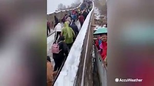 12K views · 221 reactions | Tourists struggled to walk along the Great Wall of China on Saturday, after a winter storm coated the historic attraction in snow and ice. https://bit.ly/3lZumBt | AccuWeather | Facebook