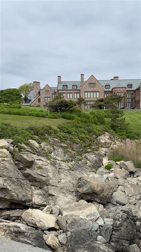 Rough Point crowns the ocean edge at the south end of Bellevue Avenue with lawns that run to the cliffs and the Cliff Walk just below. Peabody and Stearns designed the house for Frederick William Vanderbilt in the late 1800s, and Doris Duke later made it her Newport home. Today it is a museum cared for by the Newport Restoration Foundation. From the path you see stone walls, wind shaped grass, and steady Atlantic swells. It is a place where grand architecture meets open water in a single view. A