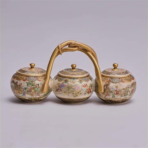 An unusual and beautifully decorated Japanese Satsuma triple condiment pot
