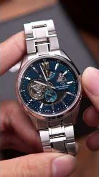 Orient RE-AV0114E00B Watch - A Captivating Green Skeleton Dial for Gentlemen!