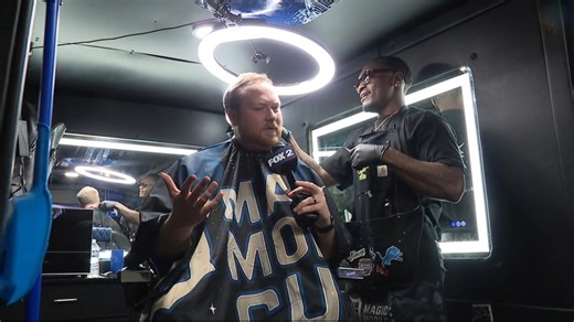 Mobile barber shop rolls around Detroit for auto show