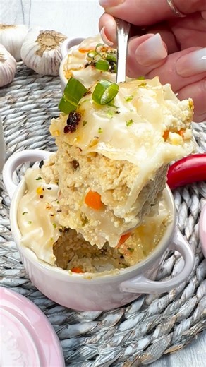 Joe - Vegan recipes on Instagram: "🥟 Viral Dumpling Lasagna (Vegan) If lasagna and dumplings had a vegan baby… this would be it. No pasta. No oven. Just crumbled tofu, dumpling wrappers and pure cosy comfort. Steamed gently until soft and saucy, finished with chilli oil because obviously 🌶️ Save this one — it’s dangerously easy. Ingredients: makes 3 10cm cocottes 300g firm tofu pressed 1 carrot 5 spring onions 3 garlic cloves 1 piece ginger 2 tbsp soy sauce 500ml vegetable stock 18 dumpling wr