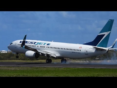 WestJet B737-700 & B737-800 landing at V.C Bird International Airport Antigua