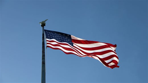 Why are Colorado flags at half-staff?