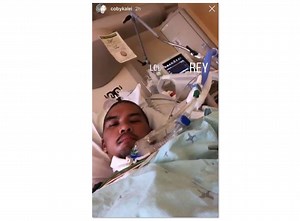 After weeks in a coma, Hawaii man battling COVID-19 awakens and posts a selfie for his loved ones