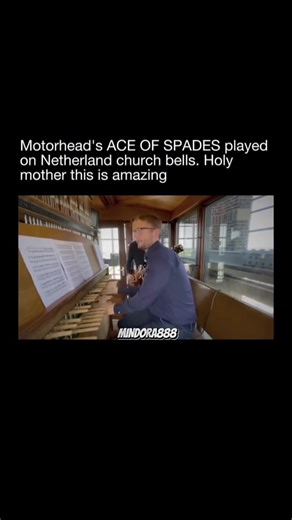 R.I.P Phil Campbell 🙏 Heavy metal church bells 🤘 A quiet Dutch church tower suddenly blasts out the unmistakable melody of Motörhead’s “Ace of Spades.” Inside the bell chamber, a carillonneur sits at the wooden keyboard, striking the batons with fists and feet while the heavy bronze bells thunder across the town square. Shoppers and pedestrians look up in confusion as the legendary rock riff echoes through the streets, turning a normal afternoon into a surreal live performance ringing from the