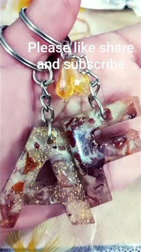 resinart#epoxy resin#keychain art"Golden Resin Alphabet Keychains Handmade with Love & Shine#viral