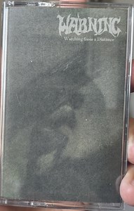 Warning - Watching From A Distance