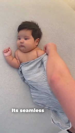 Swaddelini on Instagram: "Swaddling made simple. Say hello to the Swaddelini, the game-changer in baby sleep. No more wrestling with blankets or worrying about midnight escapes. Our 3D-knit sleep sack hugs your little one snugly, giving them the comfort they need for a peaceful night’s rest. Ditch the complicated wrapping and embrace the ease of the Swaddelini. #swaddlesack #sleepsack #swaddelini #infantsleep"