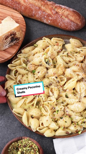 Creamy shells with a pistachio crunch. INGREDIENTS 1 C Pecorino Toscano, grated 1/2 C Roasted pistachios, roughly chopped 3 cloves garlic, sliced 1/2 C butter, cubed 1/4 C olive oil Pasta water as needed 1/2 lb pasta shells, dry DIRECTIONS STEP 1: GARLIC Thinly slice the garlic and cook in olive oil. I start the oil hot (technically a sauté) but then immediately drop the heat to low so the garlic can slowly cook for a few minutes without browning. Drain the garlic through a strainer and retain t