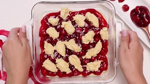Quick and Easy Cherry Pie Bars with a Cream Cheese Glaze is such a fun and delicious dessert to make when you don’t want to spend a lot of time in the kitchen. https://mooreorlesscooking.com/quick-and-easy-cherry-pie-bars/ | Moore or Less Cooking Blog
