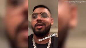 British cruiserweight boxing champion Lawrence Okolie seen with gun