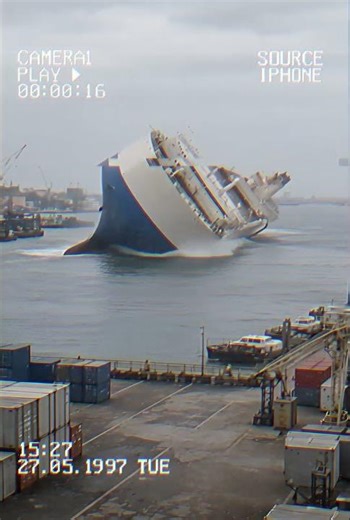 Massive Cargo Ship Suddenly Capsizes in Harbor