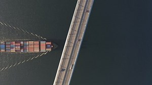 Container Ship Passes Under Large Bridge Stock Footage Video (100% Royalty-free) 1081862027 | Shutterstock