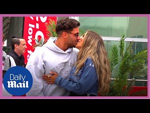 Love Island winners Davide and Ekin-Su share kiss touching down in UK