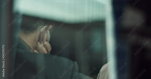 Japan businessman, travel and train in headphones, podcast and public transportation on metro bullet. Professional, person or suit in fast vehicle in motion blur, work trip or digital audio playlist