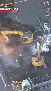 Rescuers building ramp to reach 74-year-old trapped in sinkhole | NHK WORLD-JAPAN