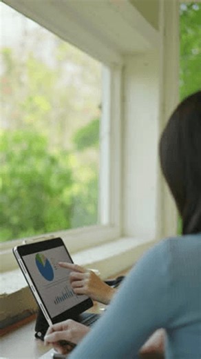 clip-4036468753-analyzing-business-data-trends-office-environment-digital