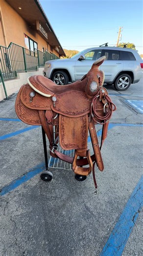 A beyond beautiful custom show saddle in like new condition made by Broken Horn Saddlery. 16