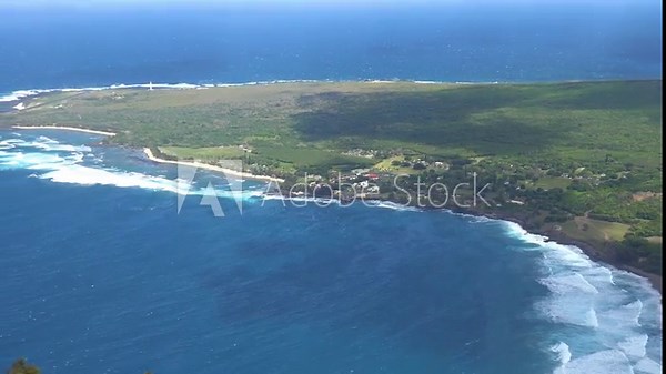 MOLOKAI - 3.19.2024 - Very good aerial footage zooming out from the leper colony on the coast of Molokai, Hawaii.