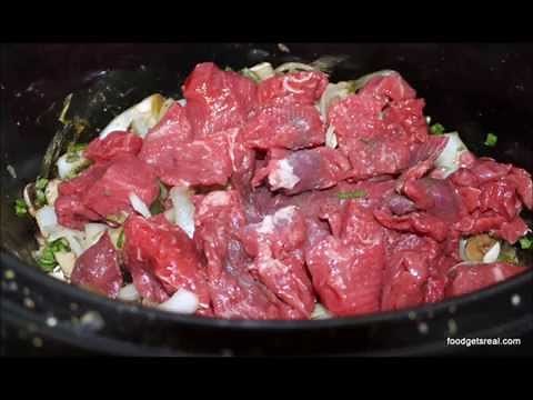 diced beef in a slow cooker (crockpot)