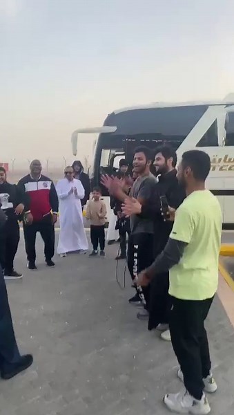 Coordinated Clapping Routine in Traditional and Casual Wear