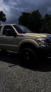 64K views · 677 reactions |  2011 F-250 Lariat 4x4 — clean southern truck with no rust, loaded leather interior, aftermarket bumpers, 22s, and tinted windows. It’s gold, sure — but it needs nothing. Priced firm at $19,500, a few grand under book. Call or text 321-501-9911 — what’s really holding you back?  Drop it in the comments  | Diesel Truck Source | Facebook